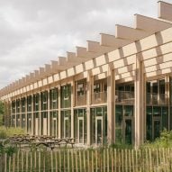 Atelier du Pont creates "woodland atmosphere" for timber office at Parc de la Villette in Paris