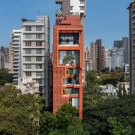 Spasm Design wraps 12-storey home in terracotta facade