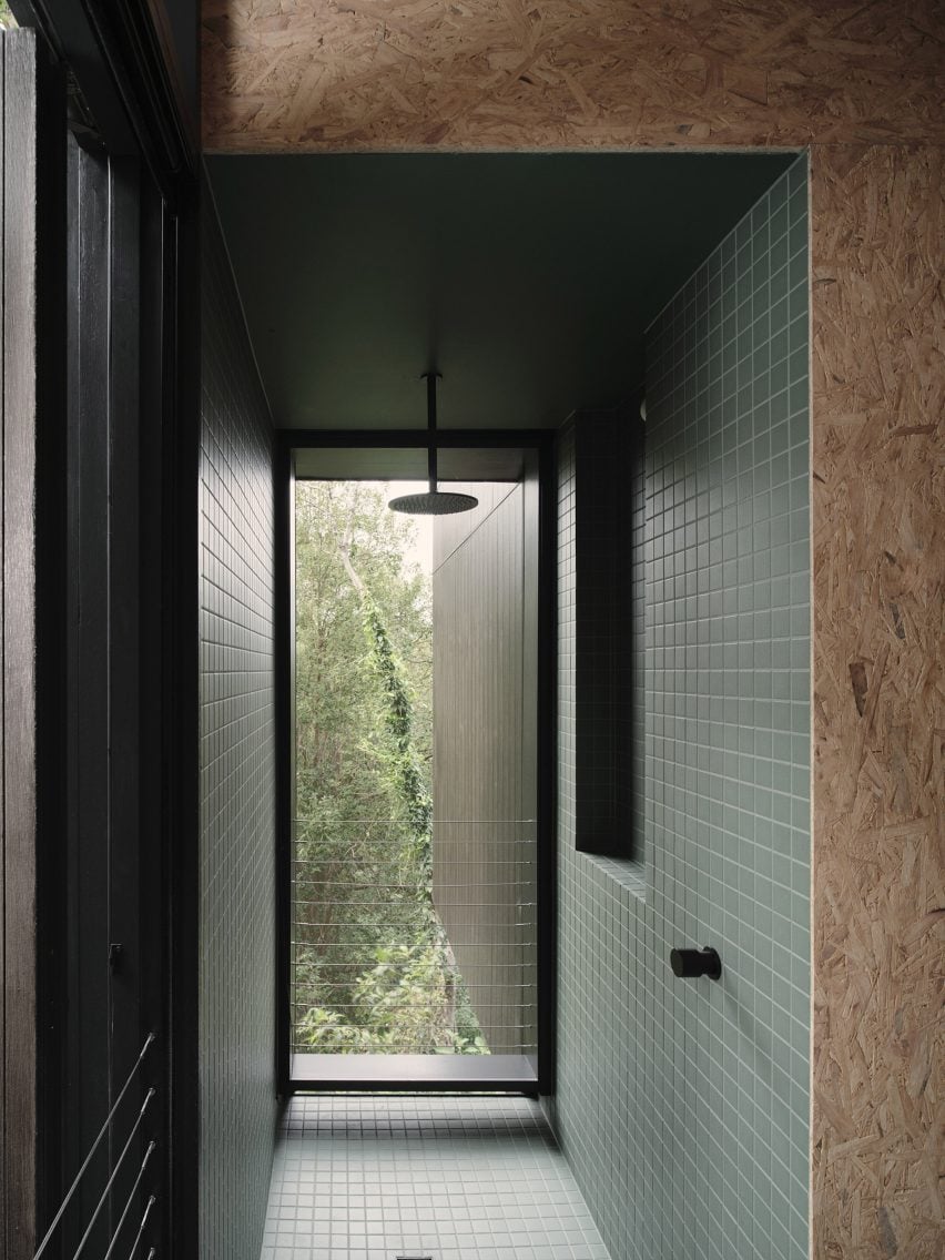 Shower room within angular home by Fouché Architects