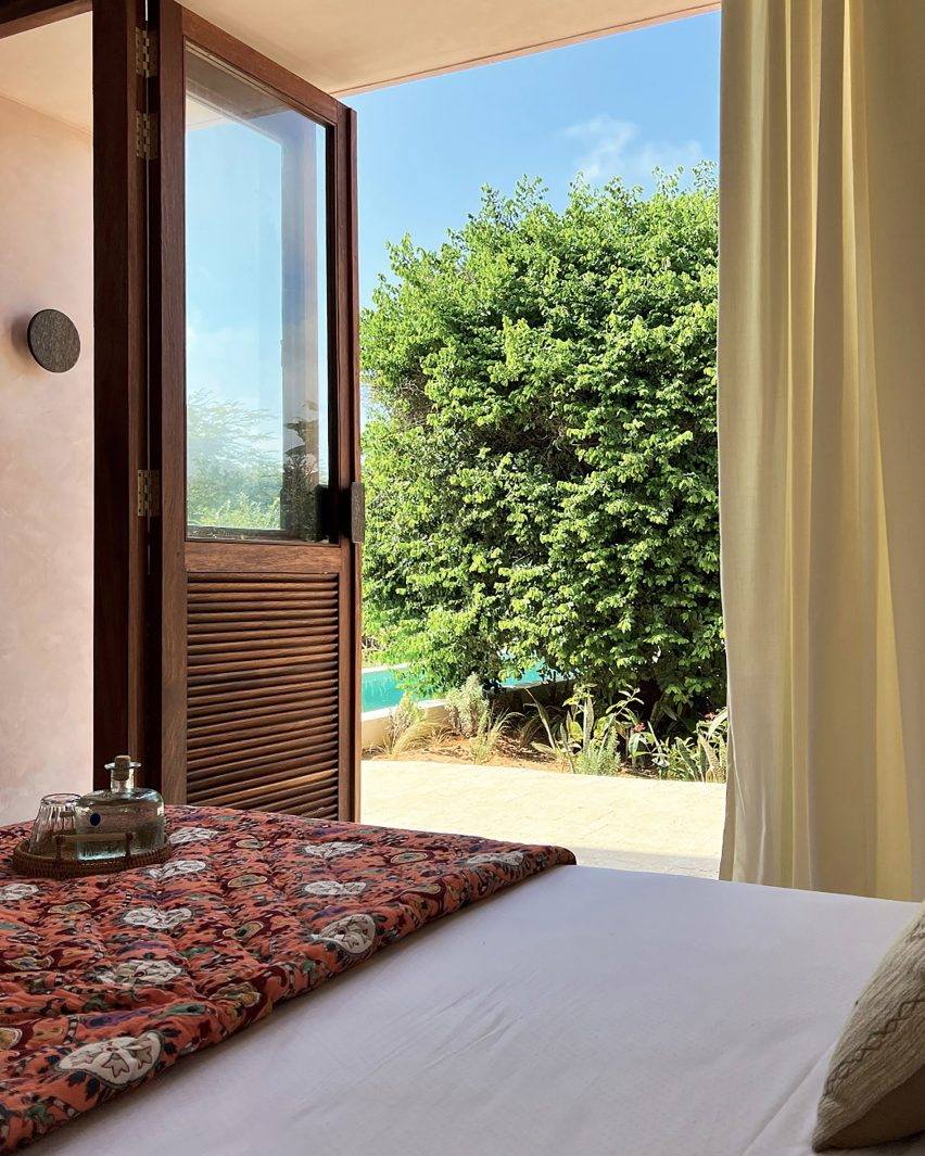 Bedroom interior within UA House in Kilifi, Kenya