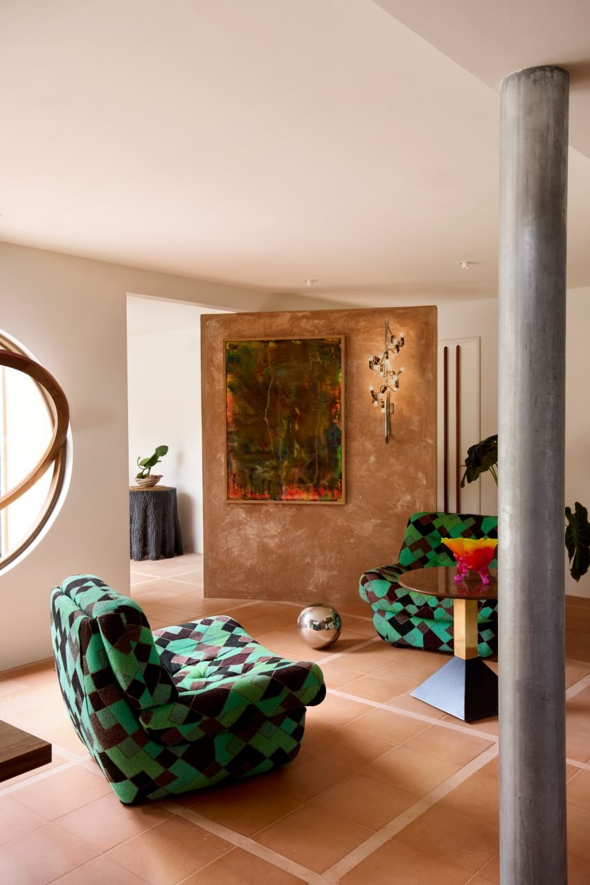 Lounge area with checkered armchairs in Byron Bay home 