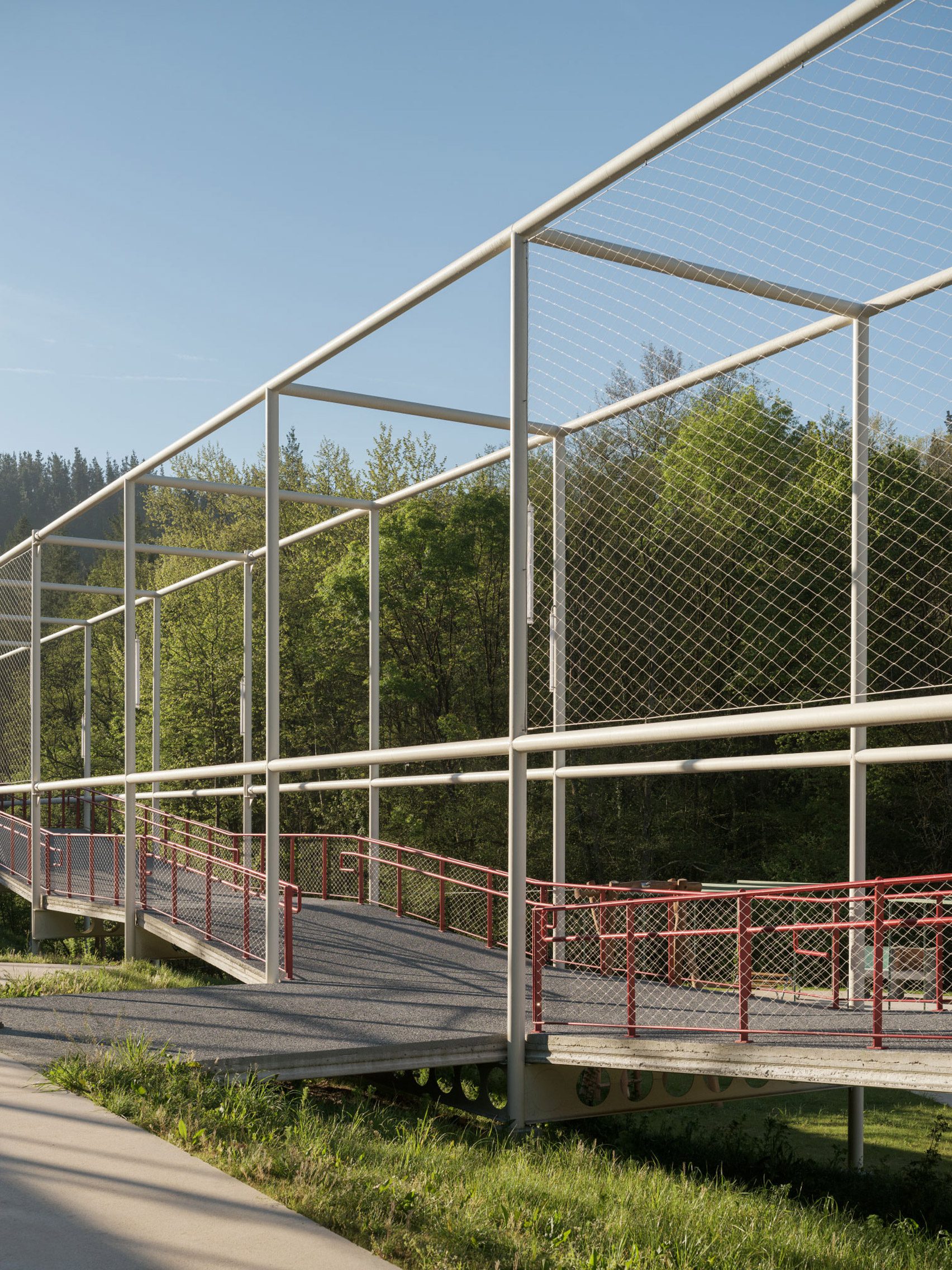 Walkway framed by steel grid