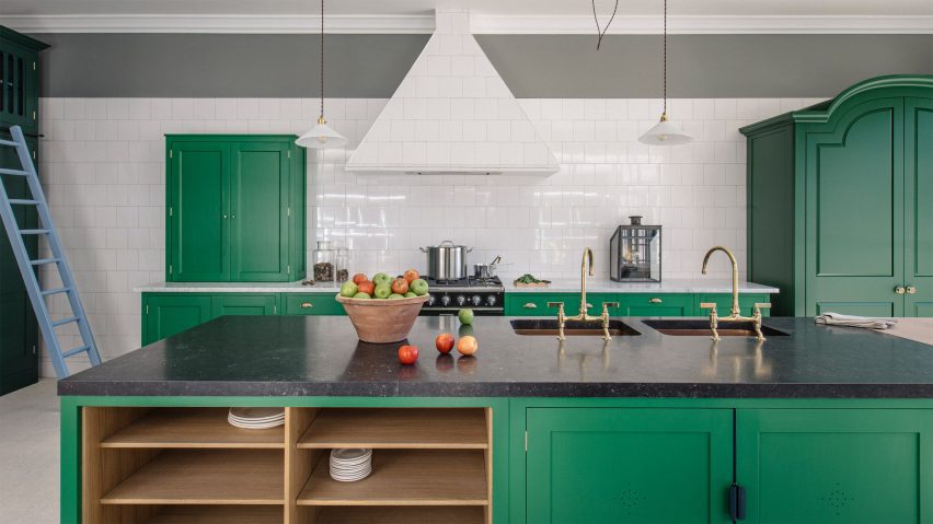 Photo of kitchen with green cupboards by Plain English