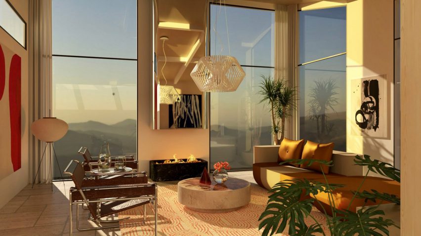 Living room interior of an apartment, with two large floor-to-ceiling windows.