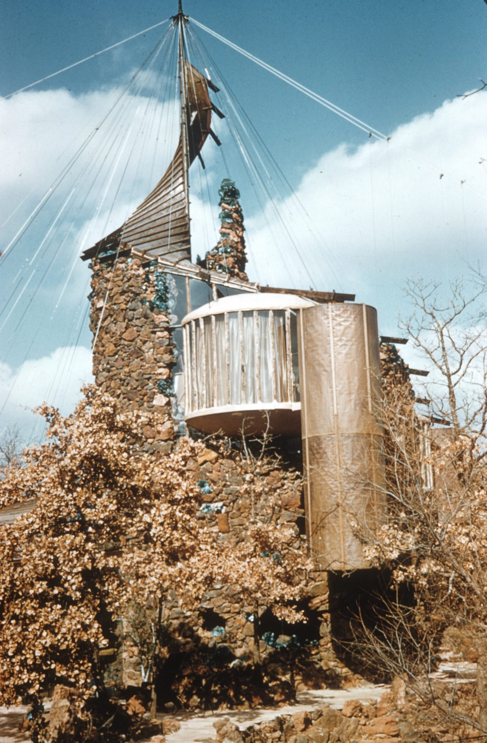 Stone house with wires coming from the top