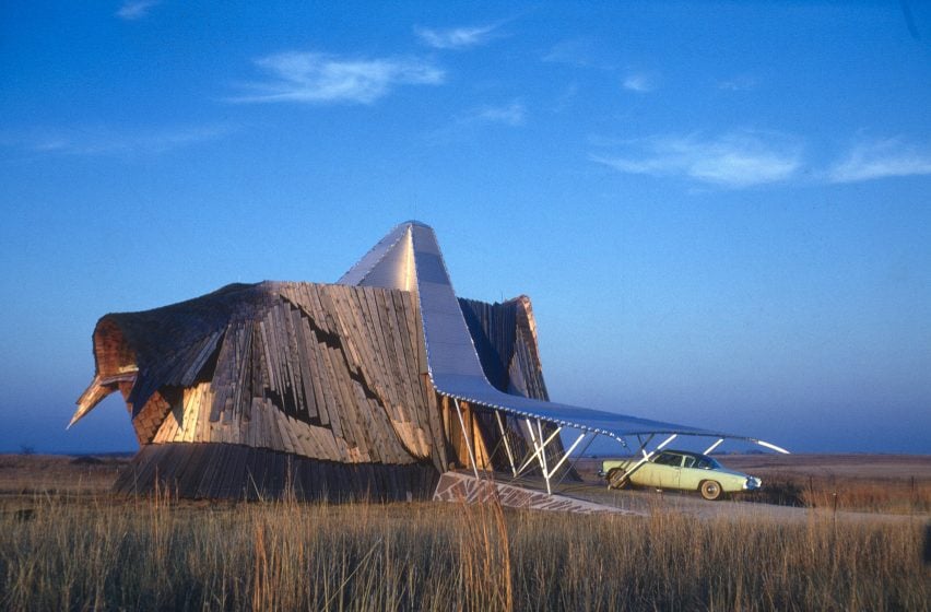 Prairie house with car in drive