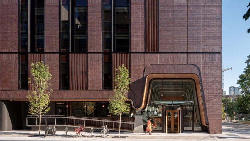 Brick building with sculptural entrance