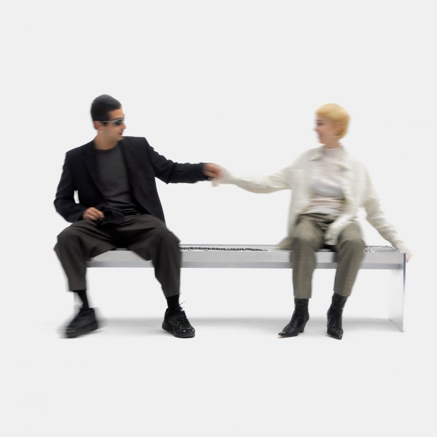 People sitting on aluminium bench