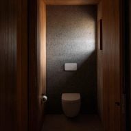 Darkly lit interior bathroom