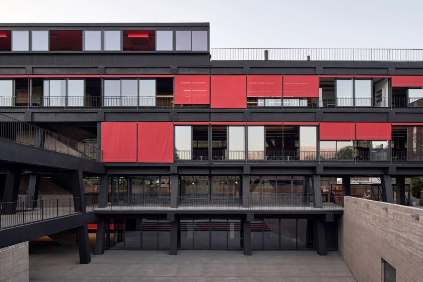 Facade of FADEU building with red curtains