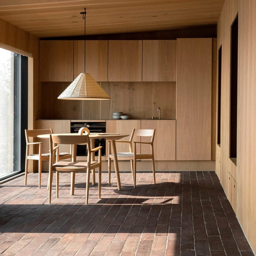 Brick-floor kitchen of Fjord Boat House