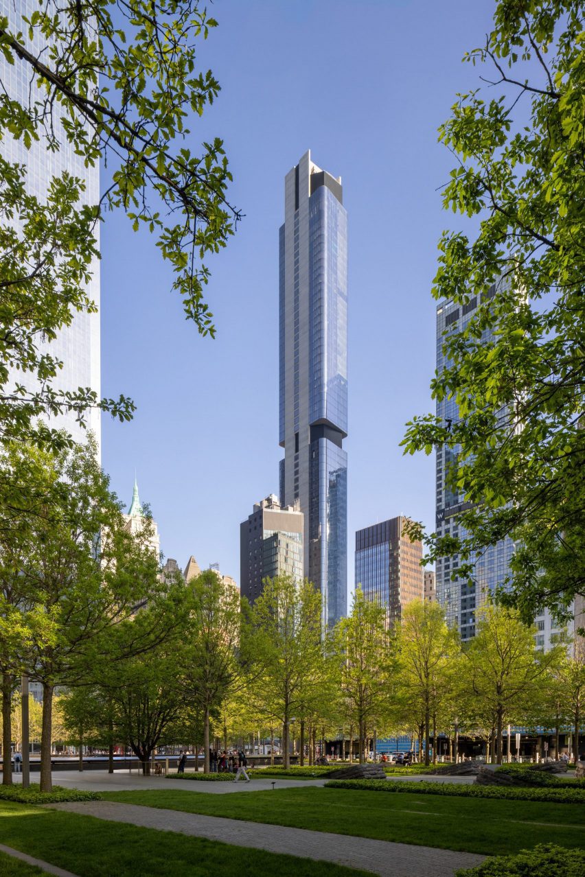 Glass tower NYC rising above the treeline