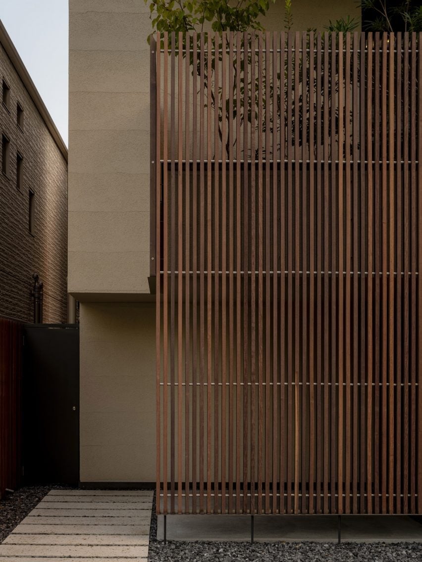 Louvres shading entrance of Tokyo home