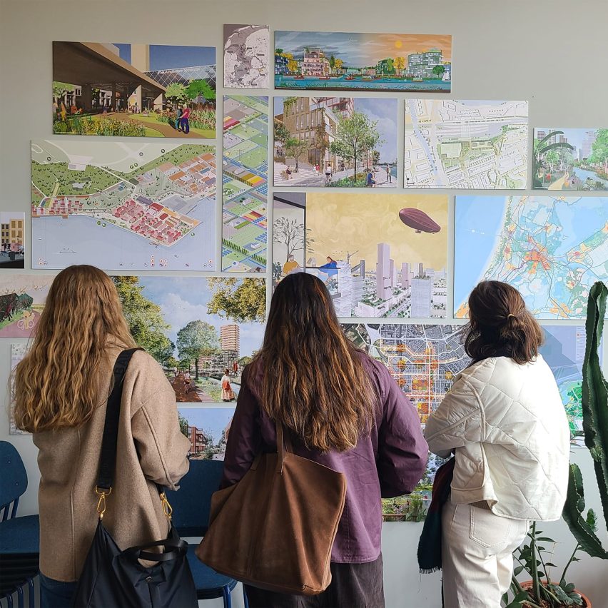 a photograph of people viewing student work