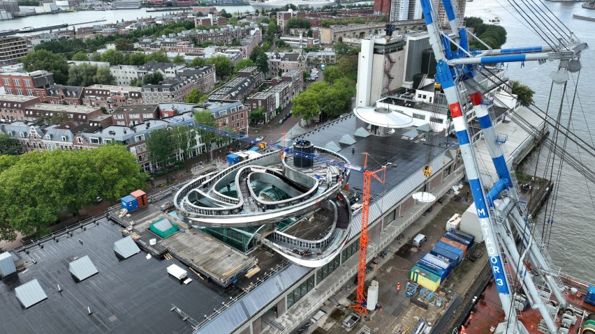 Steel spiral staircase being installed