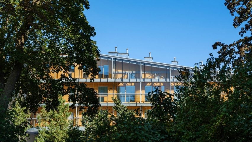 Meander housing complex surrounded by trees