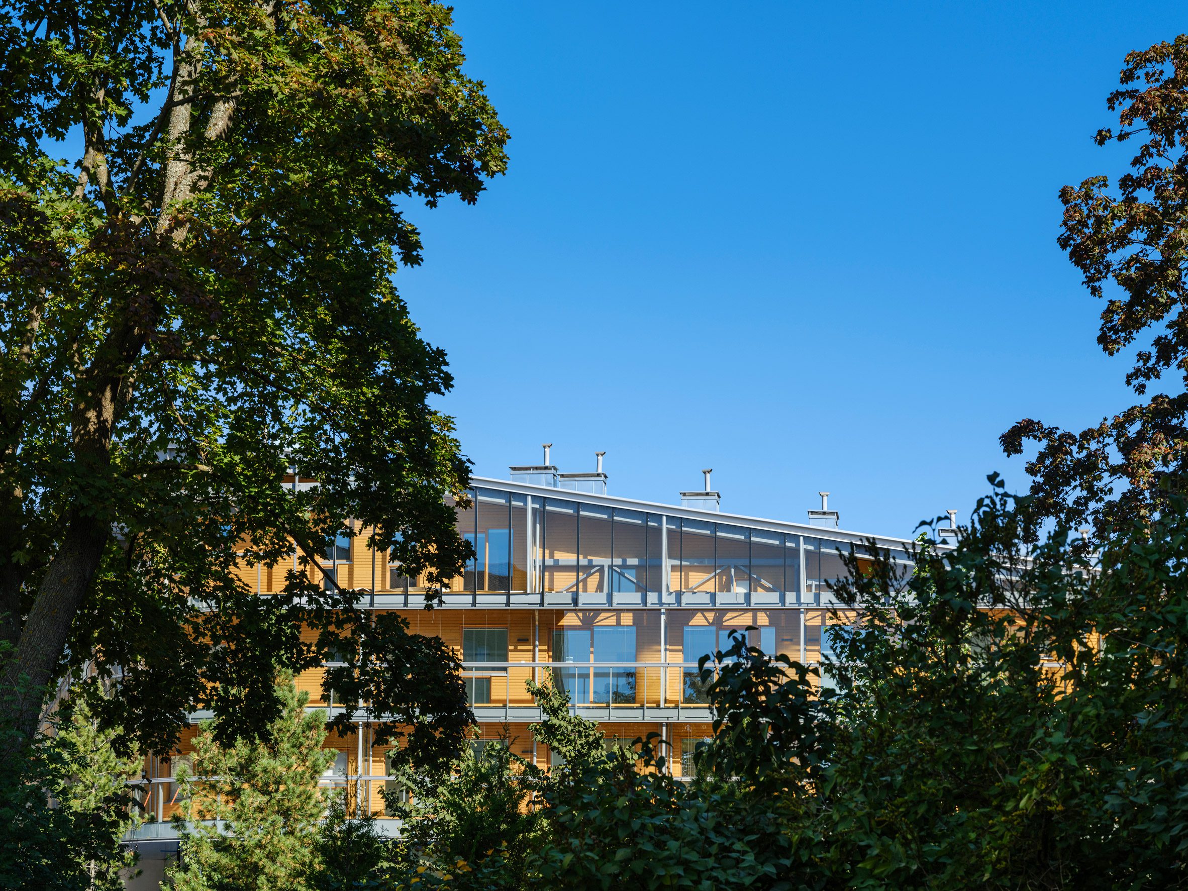 Wooden and glass-lined housing in Helsinki