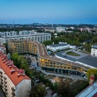 Steven Holl winds Meander housing around gardens in Helsinki