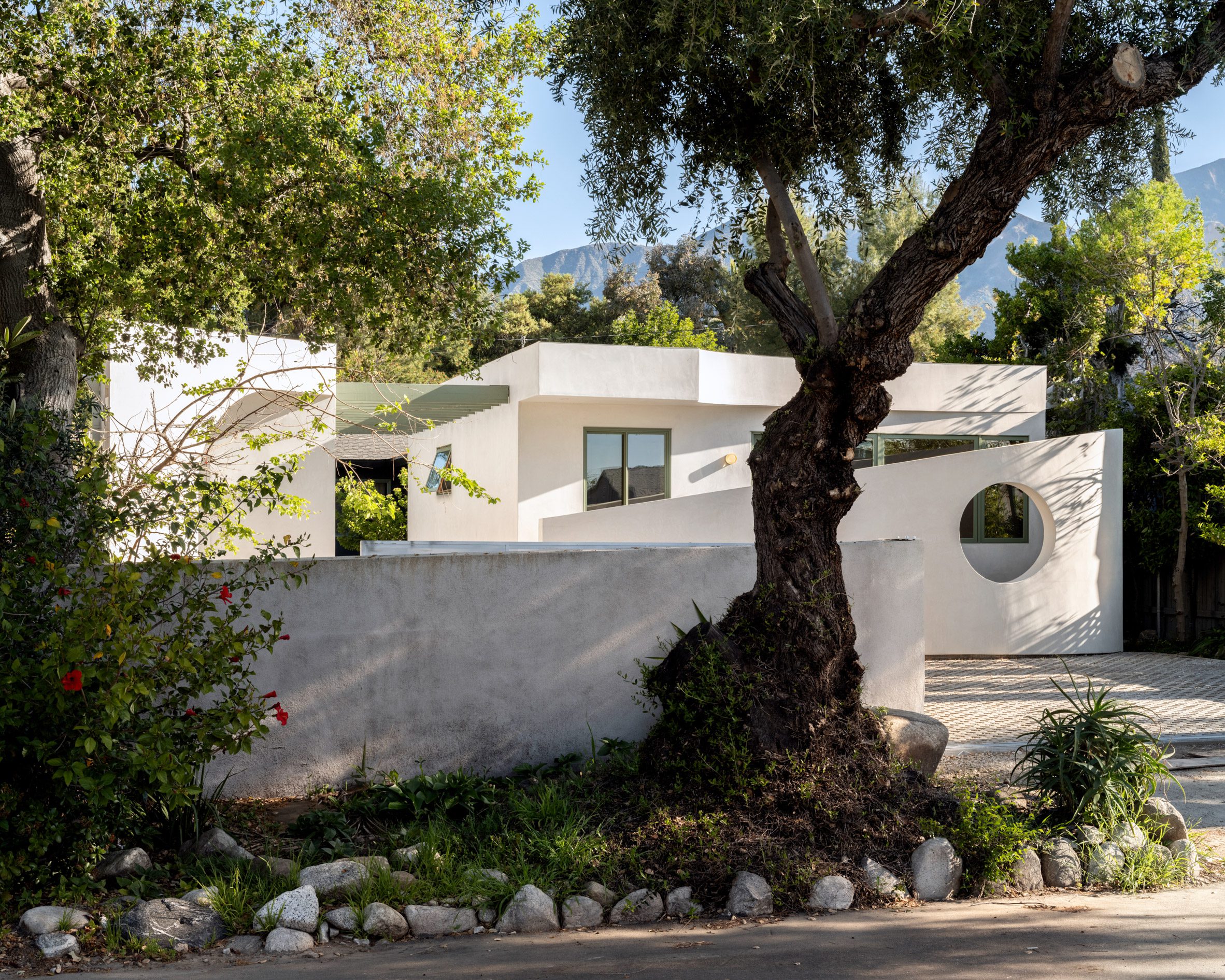 White ADU seen from the street