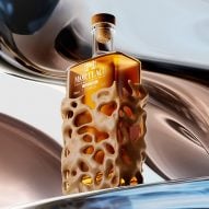 Phillippe Starck covers Mortlach whisky bottles in metallic "brain" cases