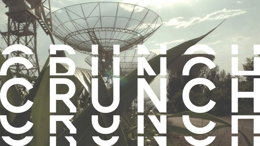 A photograph of a satellite dish behind a plant, with distorted white text over it reading 'crunch'.