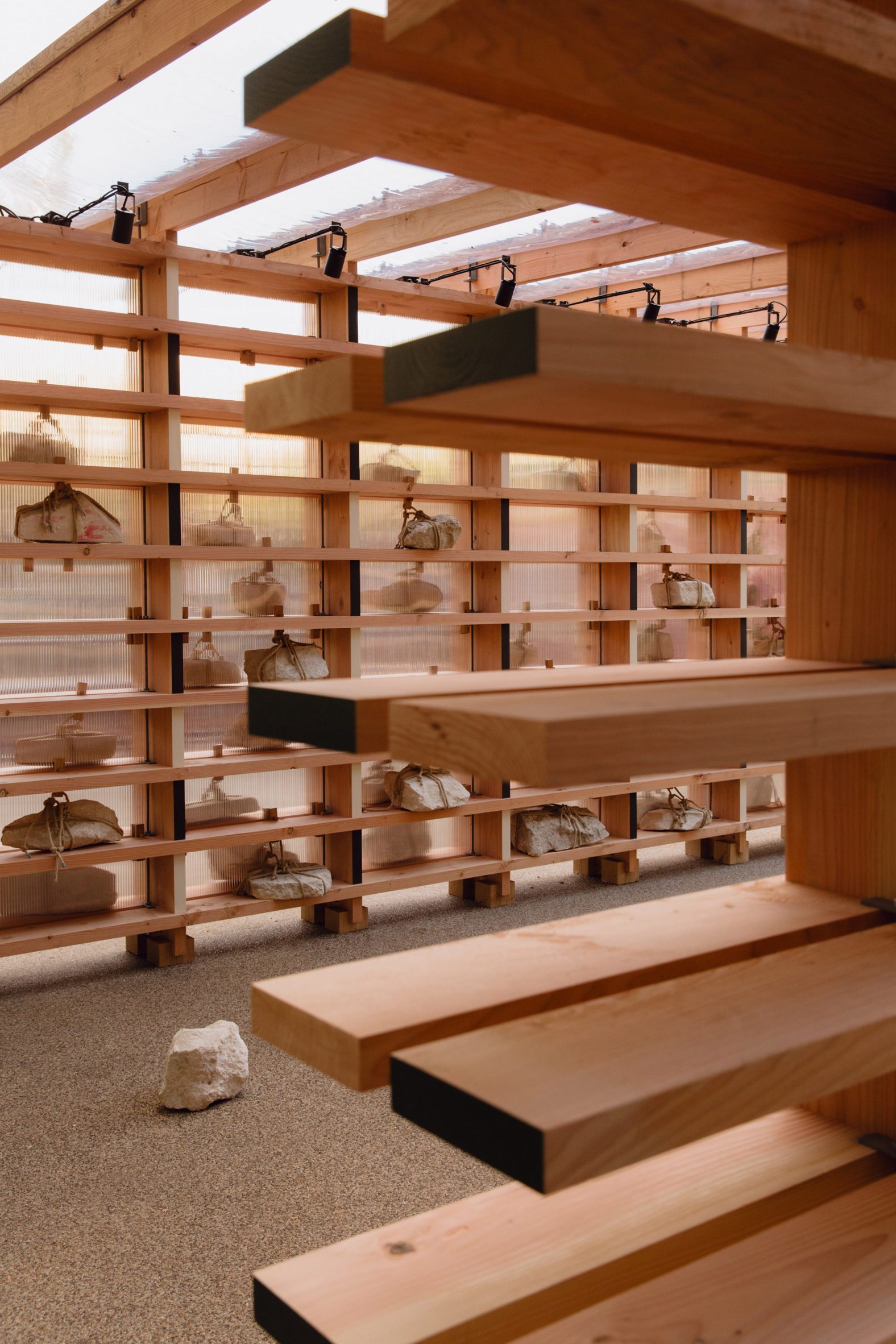 Close-up of stones on wooden shelves