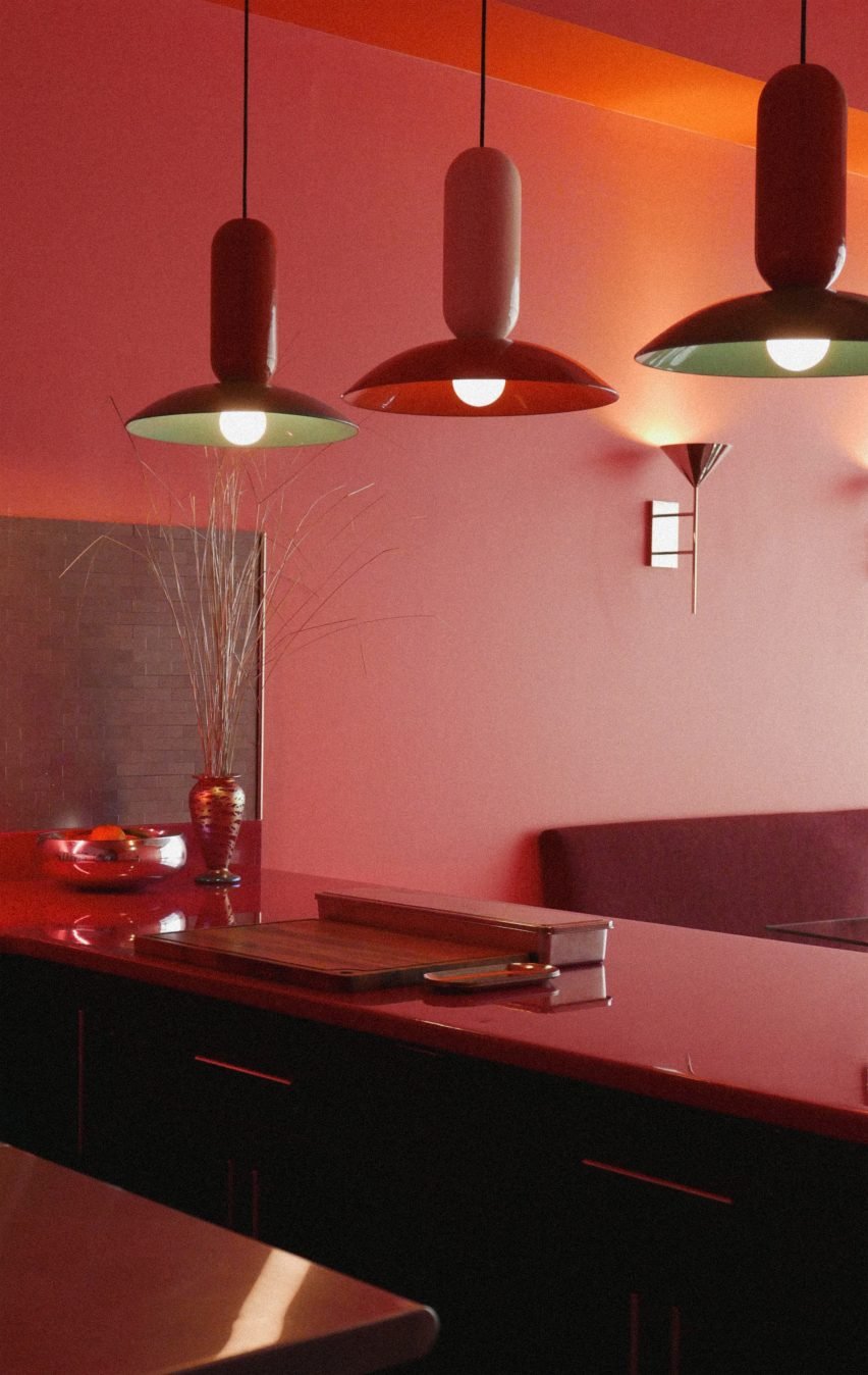 Small open kitchen with ceramic pendant lights over a peninsula