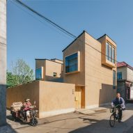 CPlus Architects uses pale bricks for "rustic" home in rural China