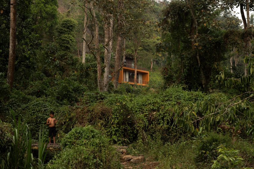 URUL house covered in greenery in forested site in Kerala