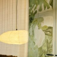 Rice paper lantern and mural of green leafy scene