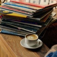 Maple timber joinery with pile of records