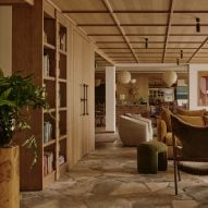 Nicemakers renovates Swiss chalet interiors with mid-century modern furniture