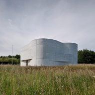 Rørbæk og Møller Arkitekter unveils curved concrete church in Roskilde