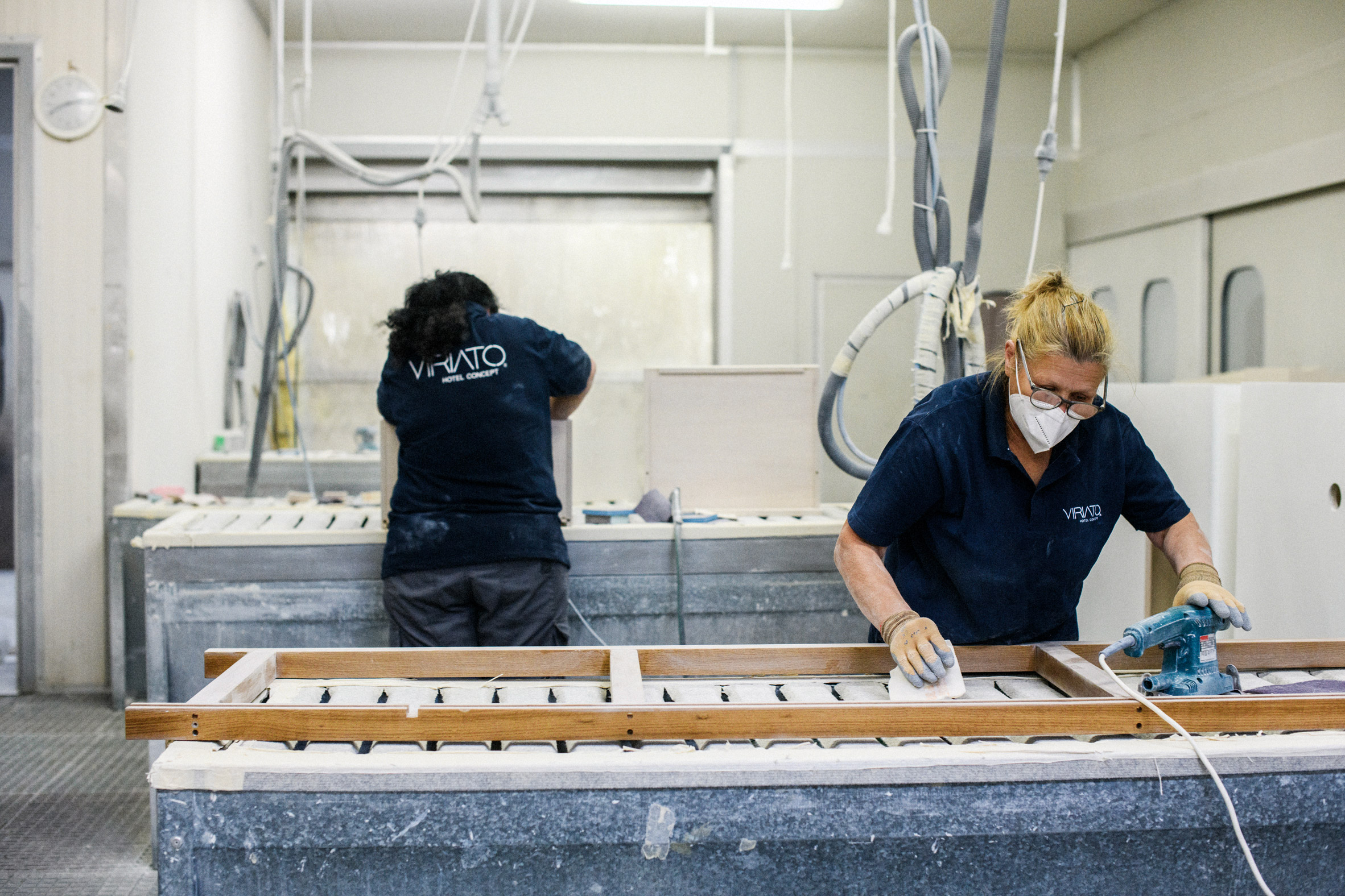 Viriato workers creating furnishings in a factory