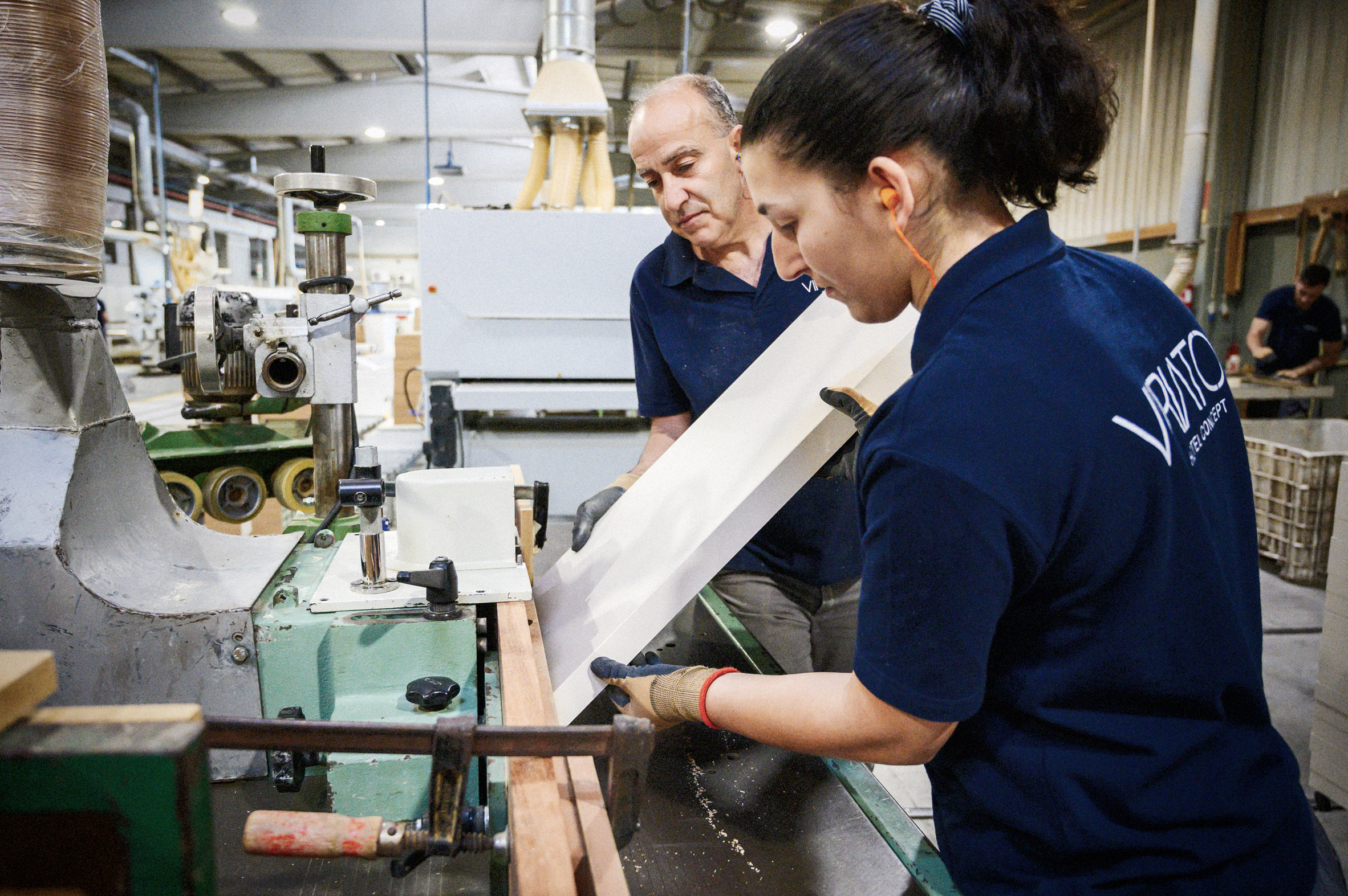 Viriato workers creating furnishings in a factory