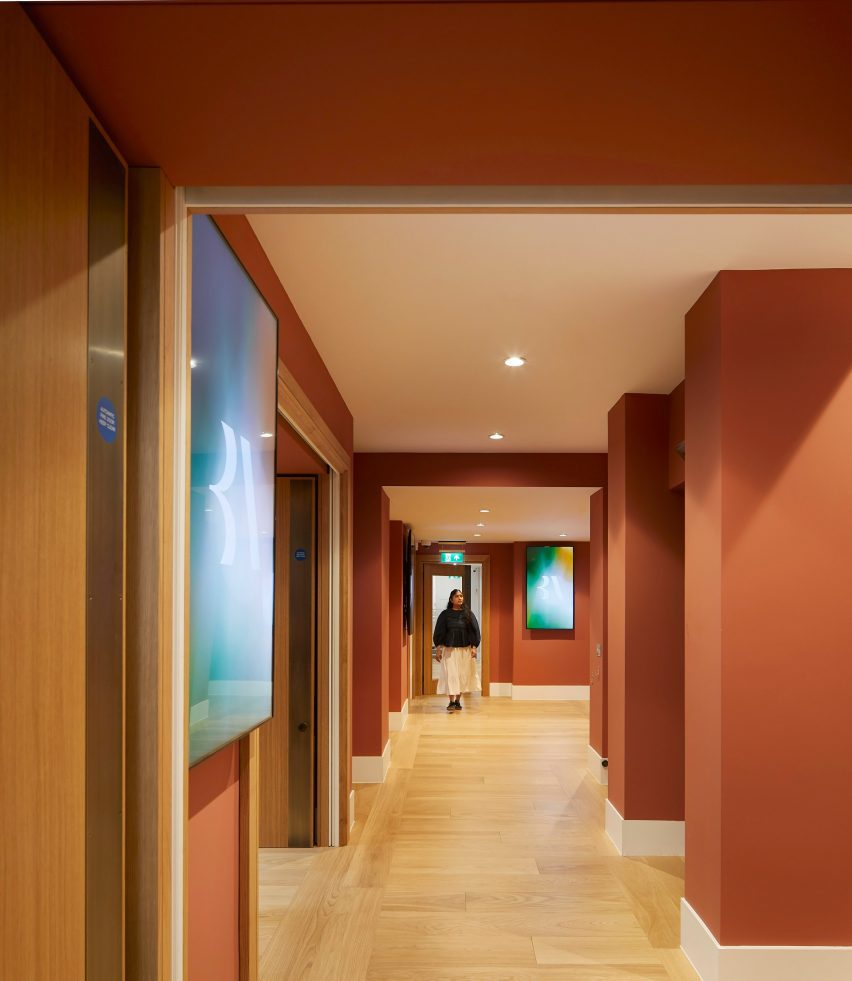 Red-painted walls in the corridor of the British Academy