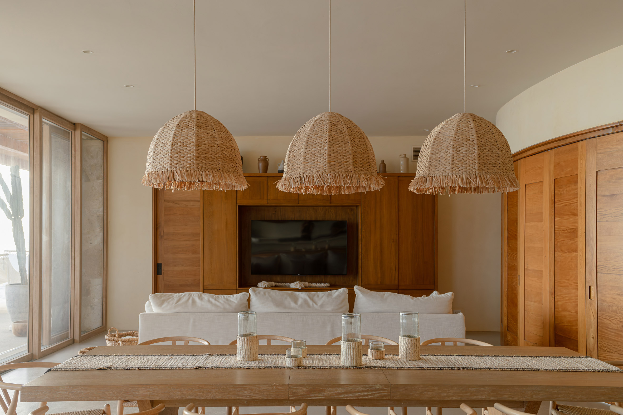 Dining space interior within holiday home by YDR Studio