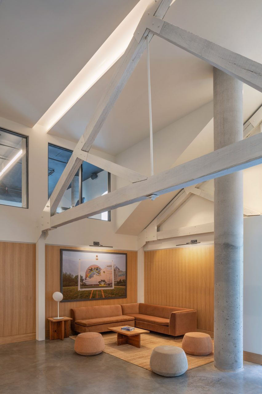 Lobby with exposed trusses and exposed concrete columns