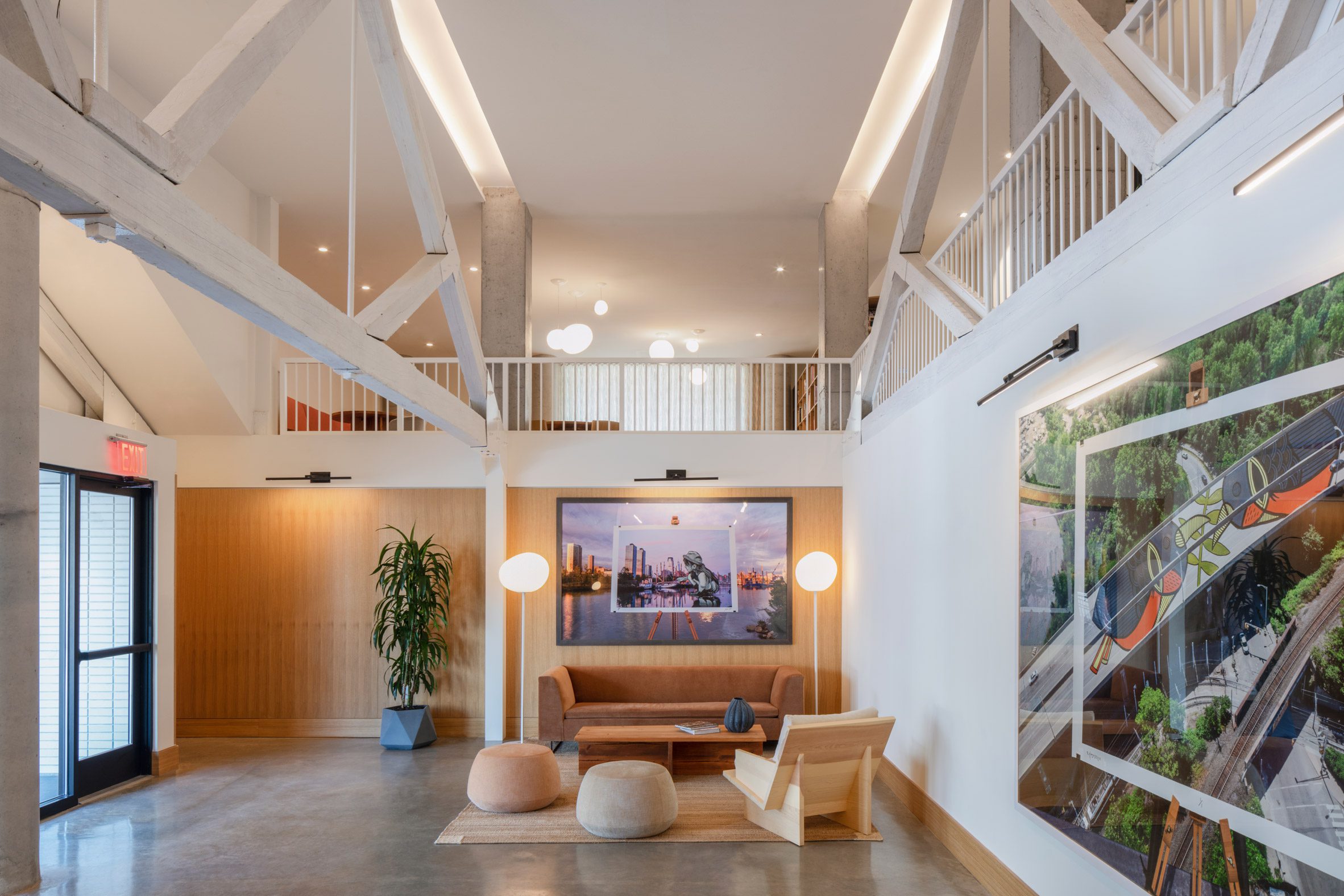 A lobby located within a gabled former warehouse building