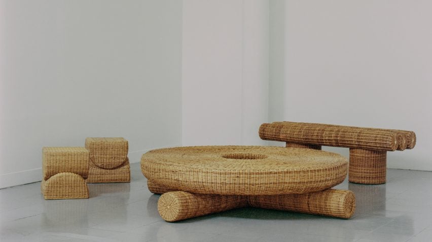 Photograph of two stools, a bench and a table woven from yaré.