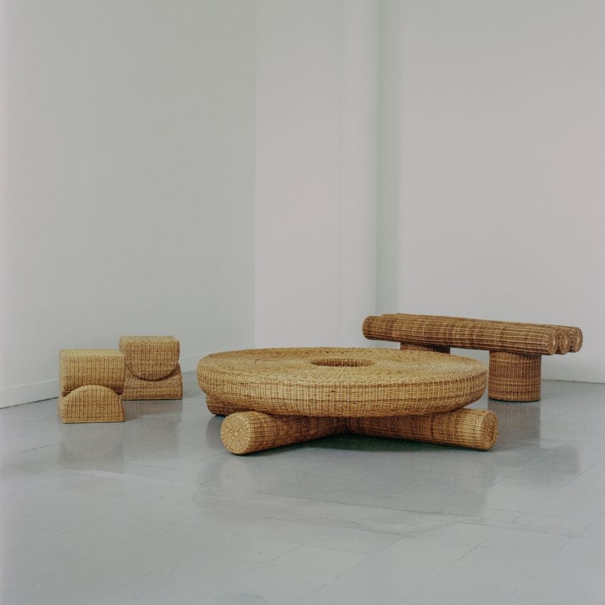 Photograph of two stools, a bench and a table woven from yaré.