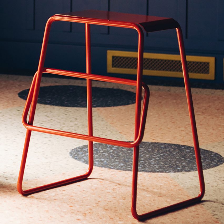 Red stool with loop piping