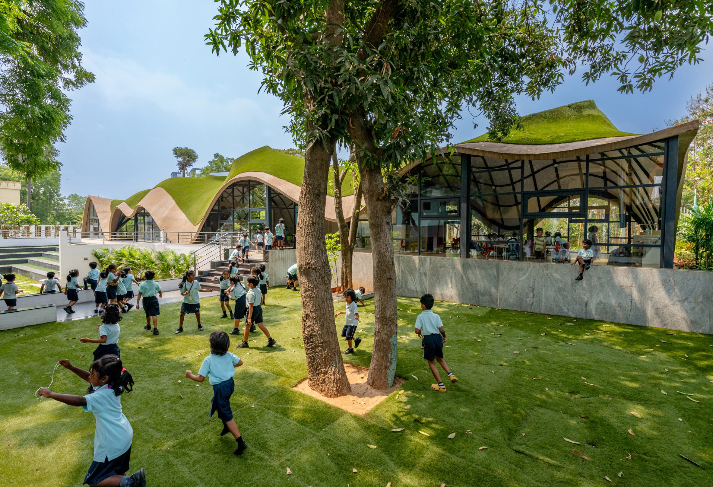 Outdoor area within Indian school by Andblack Studio