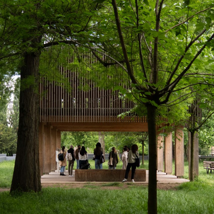 people inside a wooden pavilion