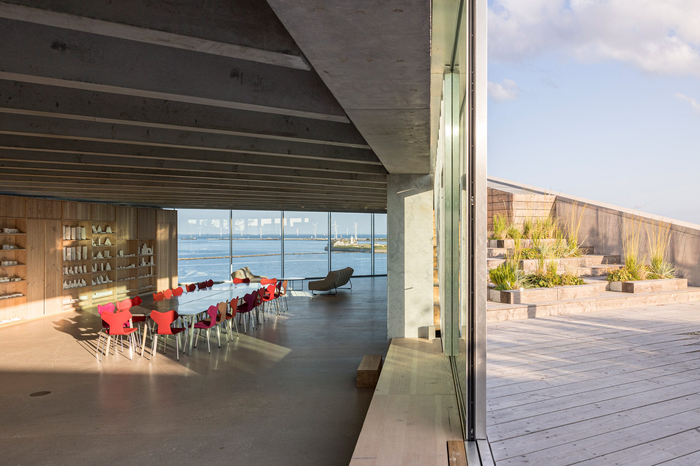 Office interior within concrete headquarters by BIG