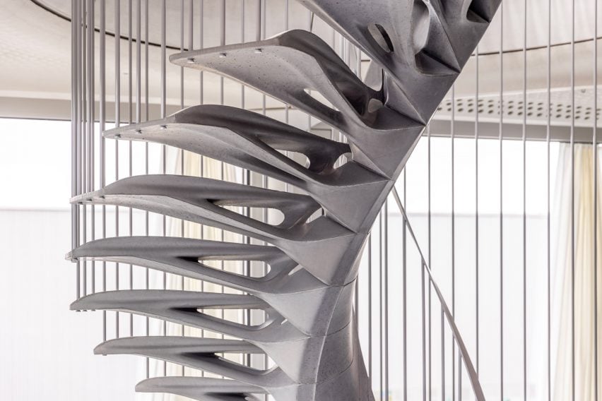 Medium close-up photo of the Cadenza concrete staircase showing thin and contoured steps 