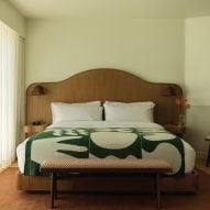 Bedroom with green blanket