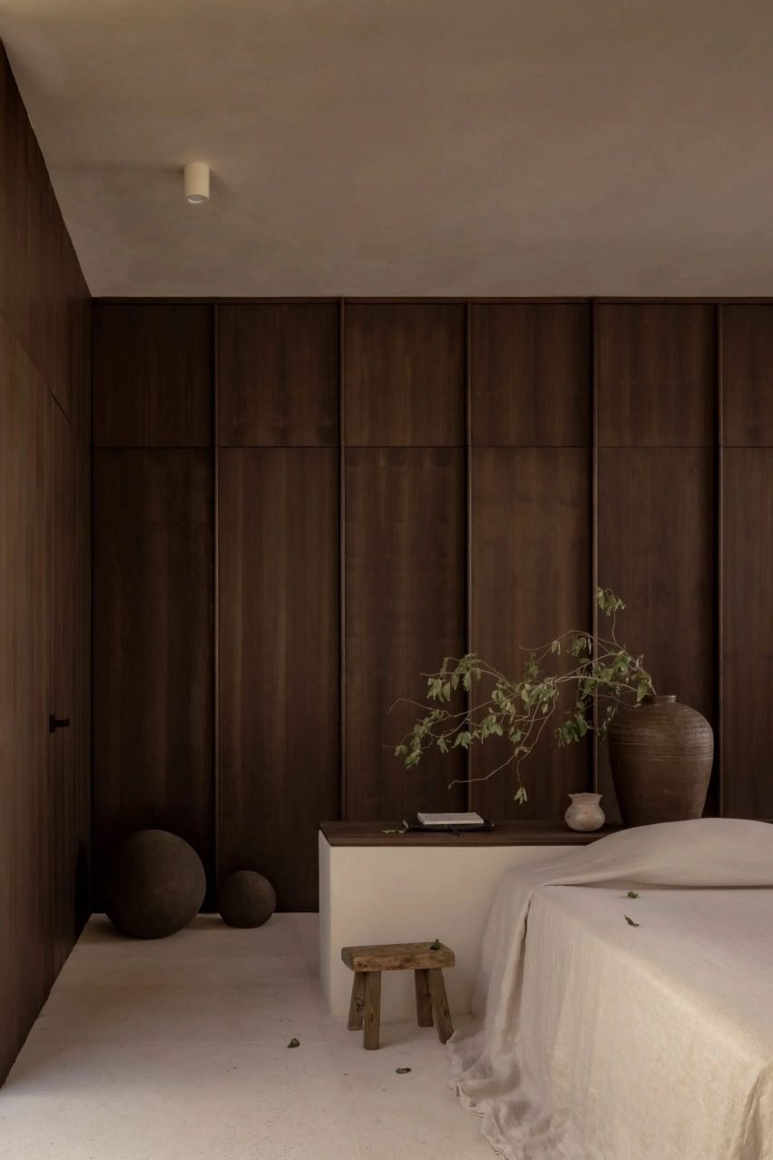 Dark wood panelling in bedroom