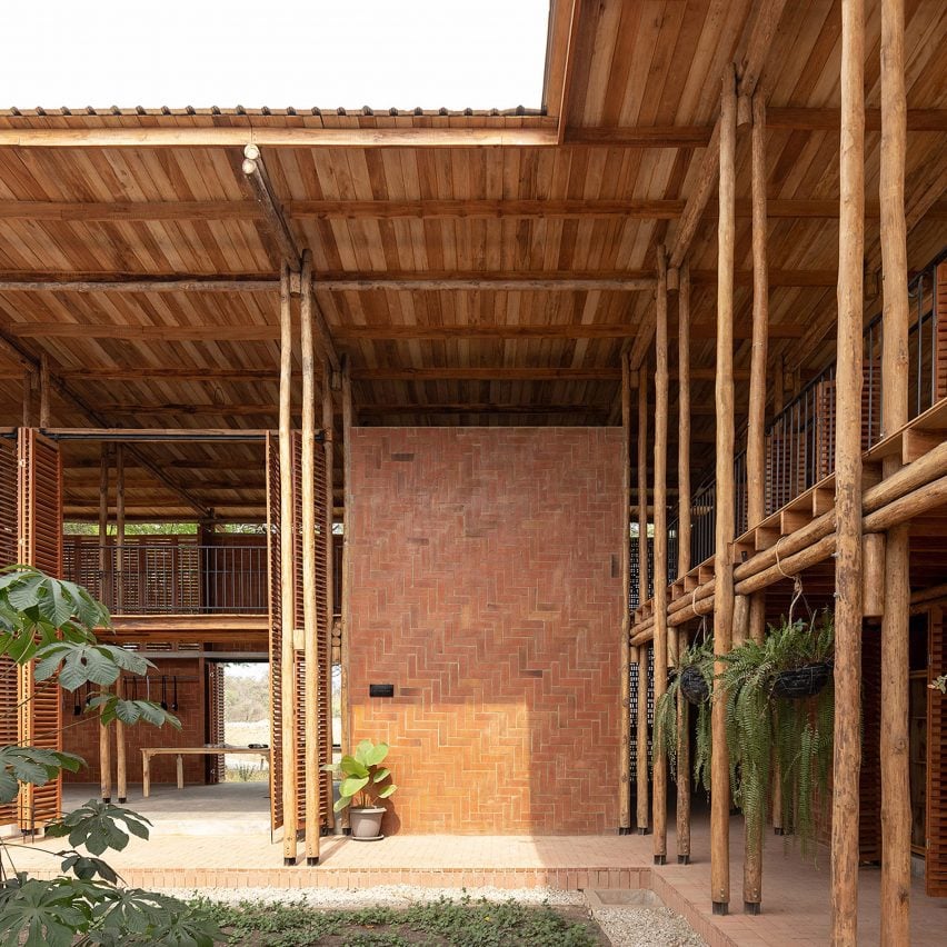 A building with brick wall and wooden structure