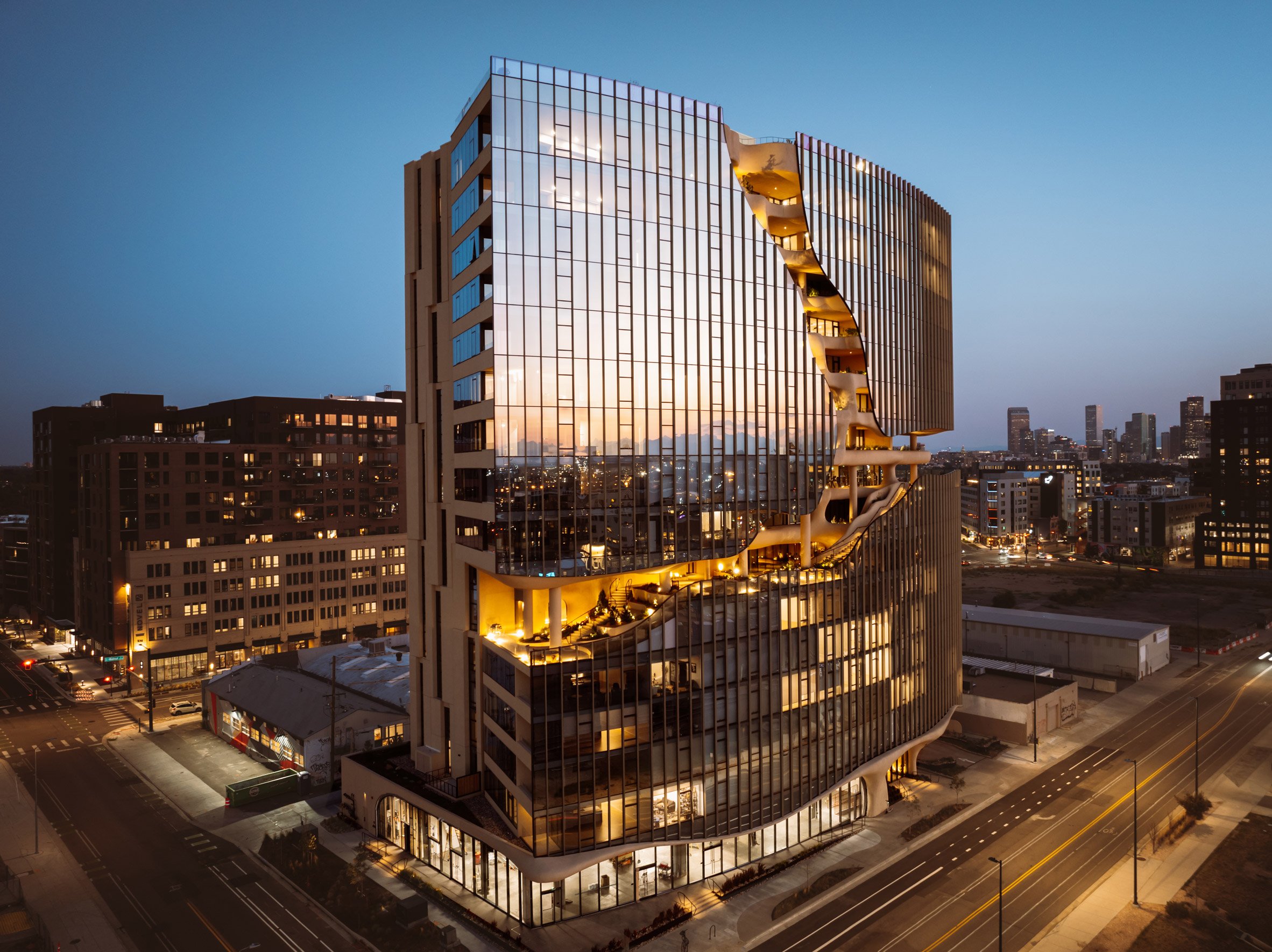 Canyon in glass apartment building at night